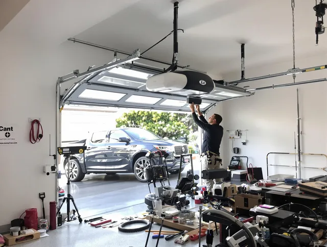 Tallmadge Garage Door Repair specialist installing smart garage door opener system in Tallmadge home