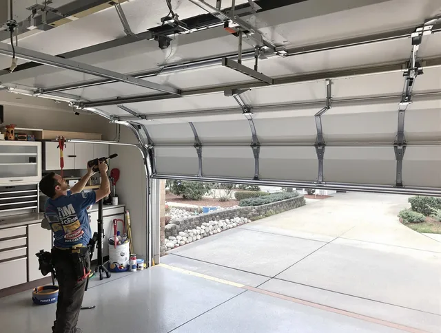 Garage door track repair service by Tallmadge Garage Door Repair in Tallmadge